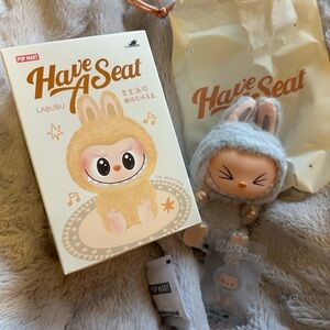HEHE- Pop Mart Labubu Have A Seat.New. Grey. Color.Box opened to verify.